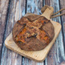 Cheddar jalapeno sourdough bread on a cutting board